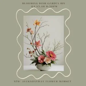 Floral arrangement in decorative dish garden.