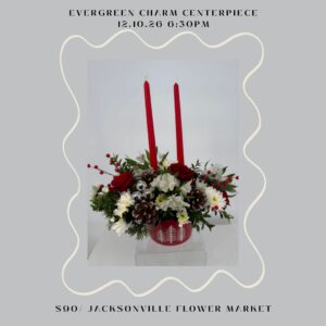 Festive centerpiece with red candles and pinecones